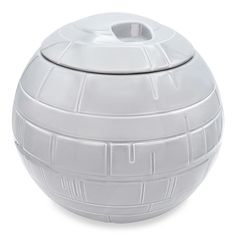 It's time to harness the power of this fully-armed and operational Star Wars Death Star Ceramic Jar for your kitchen or office. With the ability to make converts of the strongest rebels, this cookie jar beckons all who walk past it from the Dark Side. Count Calories, lesser-known Sith Lord, knows you cannot resist for long. You will fall to the lure of the chocolate chip, sugar cookie, and oatmeal raisin (the only true evil in the universe) like those who came before you. (Also, this cookie jar Star Ceramic, Count Calories, Star Wars Jewelry, Star Wars Fashion, Star Wars Wedding, Ceramic Cookie Jar, Sith Lord, Star Wars Costumes, Star Cookies