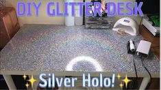 a counter top with glitter on it and the words diy glitter desk above it