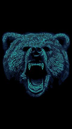 a bear's head is lit up in the dark with blue light coming from its mouth