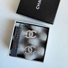 These Chanel Cc Crystal Stud Earrings Have Long Been Discontinued And Very Hard To Come By. Set In Silver Hardware And Clear Sparkly Swarkowki Crystals. The Stud Measures Almost The Size Of A Quarter Coin And They Are Therefore Considered A Size Large In The Chanel Stud Family. Excellent Like-New Condition. The Clip-Ons Are Actually Very Comfortable To Wear Hours Long. Comes With Original Tag And Box. 100% Authentic As Always. No Trades Chanel Jewelry, Crystal Stud Earrings, Chanel, Jewelry Earrings, Women Jewelry, Stud Earrings, Crystals, Silver, Women Shopping