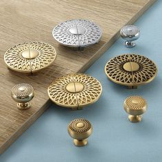 several different types of knobs and handles on a table