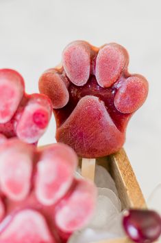 a close up of some fruit on a stick