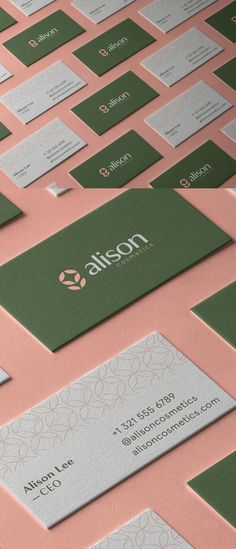 many business cards are stacked on top of each other with different colors and designs in them