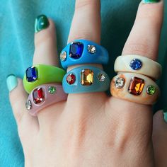 This is the Chunky Crystal Collection 🔮, made up of 6 gorgeous rings. Make sure that you choose your band color&style from drop down menu and check the size from here. Band colours&sizes: *Pink (US 7, 17mm) *Blue (US 7, 17mm) *Green (US 6, 16mm) *Baby Blue (US 8, 18mm) *Beige with Blue Crystal (US 8, 18mm) *Beige with Orange Crystal (US 8, 18mm) 📬 UK Shipping : FREE 📢 Free delivery on orders 35 USD and up to US buyers 📢💓 Vintage Multicolor Rings For Party, Tri Color Ring, Thick Band Ring, Ring Y2k, Ring Party Jewelry, Crystal Uses, Aesthetic Rings, Acrylic Ring, Purple Rings