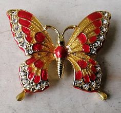 Beautiful Vintage Enamel gold tone Butterfly Brooch, Gift for Her. Quality red and gold enamelling, edged with faux diamond stones. Comes with a gift box. The pin is intact and has a safety clasp.The brooch is in very good condition with no wear. The enamel is bright and undamaged and it looks new and unused.Really elegant item.Brooch measures approx. 4.5 x 3.5 cm This would be perfect for a collector or a lovely gift!(Free postage for UK. I will always combine postage for international buyers i Planter Gift, Vintage Green Glass, Wood Jewelry Box, Butterfly Brooch, Unique Gifts For Her, Gold Enamel, Wood Jewellery, Red And Gold, Diamond Stone