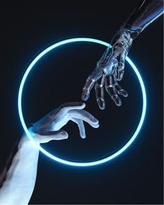 two hands touching each other in front of a circular object with neon lights on it