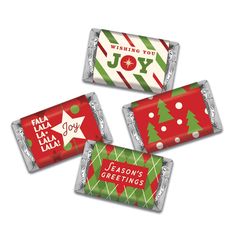 three candy bars with christmas designs on them