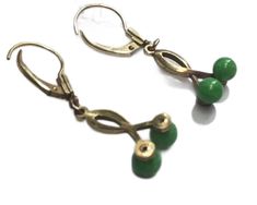 Vintage designer earrings green bead Germany signed K & L gold  ITEM DESCRIPTION: Offering these tiny cute German Signed Earrings. circa estimated 1940s-50s I'm not sure if the tiny green swirl beads are stone, glass or plastic. These earrings are engraved/marked "K & L Germany". MEASUREMENTS: These stylish earrings for pierced ears measure approximately 1 3/8 inch long (drop length) and approximately 1/4 inches at their widest. CONDITION: This gorgeous earring set is in good vintage condition. Green Metal Clip-on Earrings For Gift, Retro Green Drop Earrings, Green Brass Jewelry For Party, Retro Green Earrings For Party, Elegant Green Nickel-free Clip-on Earrings, Green Clip-on Metal Earrings, Formal Green Nickel-free Earrings, Green Retro Party Earrings, Green Metal Earrings For Formal Occasions