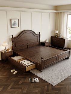 a bed with two drawers on the bottom and an open drawer underneath it in a bedroom