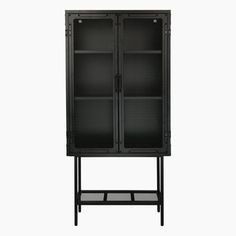 a black cabinet with mesh doors and shelves on the bottom, against a white background