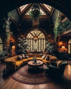 a living room filled with lots of furniture and plants on the wall next to it