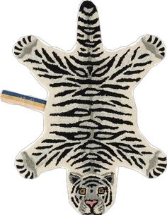 a zebra rug with a pencil sticking out of it's center and an image of a tiger on the floor