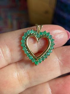 10K Gold Emerald & Diamond Heart Pendant  Perfect gift for Valentine's Day,  Birthday, Wedding, Christmas or just because  26 Prong set emeralds. Nice color and clarity, given that most emeralds set in jewelry do have inclusions  2.2 Grams on MY SCALE  BE Sure to follow on INSTAGRAM for weekly updates and sales @missionmod  CHECK OUT OUR OTHER JEWELRY, INCLUDING  CHARMS SUCH AS... VICTORIAN 18K 14K AND 10K LOADS OF GOLD TO SELL! **ALL METALS AND STONES ARE TESTED TO BE SUCH,BUY WITH CONFIDENCE THAT HERE AT MISSION*MOD WE STRIVE TO BRING YOU THE BEST WE CAN FIND...RANGING FROM VINTAGE TO ANTIQUE JEWELRY, CLOTHING AND EVERYTHING ELSE IN BETWEEN** We are more than happy to answer any question you may have about any item listed. We stand by our items here at MissionMod.  Be sure to stop by, lo Heart-shaped Emerald Necklaces For Anniversary, Heart-shaped Emerald Necklace For Anniversary, Anniversary Heart-shaped Emerald Necklace, Emerald Heart Charm Jewelry, Heart-shaped Emerald Jewelry For May Birthstone, Heart-shaped Emerald Jewelry With Birthstone, Heart-shaped Emerald Jewelry For Valentine's Day, Heart-shaped Green Emerald Ring For May Birthstone, Heart Shaped Green Emerald Ring For May Birthstone