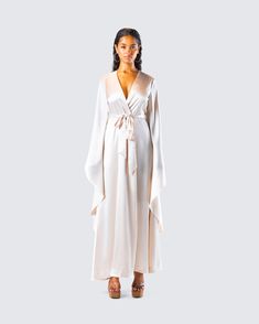 She’s boujee or whateva 👑 Made from satin fabric and complete with a tie belt and oversized bell sleeves, this robe will make you feel like a million bucks - even when you’re just lounging around 👏 Satin V-neck Robe For Daywear, Chic Silk Robe For Sleeping, Long Satin Robe For Loungewear, Silk Robe With Tie Waist For Loungewear, Silk Tie Waist Robe For Loungewear, Satin V-neck Daywear Robe, Satin Kimono For Daywear, Spring Party Satin Kimono, Spring Party Satin Robe