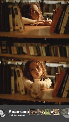 two women sitting at a table in front of bookshelves