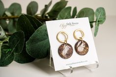 Elevate your style with our Brown Marble Dangle. Handcrafted with beautiful brown and translucent white clay, accented with flecks of gold, this earring will add a touch of sophistication to any outfit. The elegant wavy gold circle post adds a luxurious touch to this exclusive piece. a beautiful mix of my own creation to give you a faux agate look that is light weight and makes the perfect dangle for fall or anytime! micro pave rhinestones on huggie hoop Diamond Dangles have a length of about 2" Earthy Gold Jewelry For Gifts, Earthy Style Gold Jewelry For Gifts, Earthy Gold Drop Earrings, Gold Earthy Everyday Earrings, Earthy Gold Earrings For Gift, Earthy Gold Everyday Earrings, Chic Brown Round Jewelry, Earthy Gold Jewelry For Everyday, Earthy Everyday Gold Jewelry