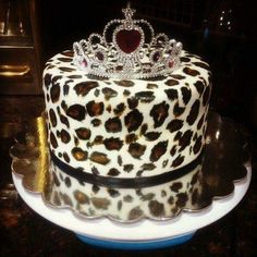 a leopard print cake with a crown on top