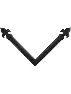 two black metal handles on a white background, one is shaped like an arrow and the other has four pointed ends