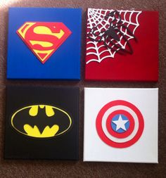 four square paintings with different designs on them, each featuring a superman symbol and a spider - man logo