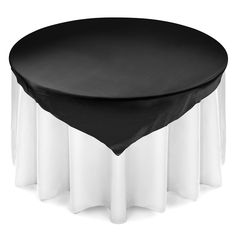 a round table with black cloth on top