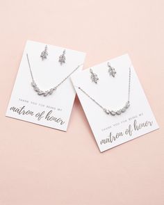 Modern & chic, our Trista Bridesmaid Pendant Set is the perfect way to thank your bridal party. Crafted with cubic zirconia gemstones in a contemporary design. Cubic zirconia Earrings 0.75" length CZ necklace detail measures 1.5" length; entire necklace is 16"-18" with extender Hypoallergenic, lead-free & nickel-free Style #1742 Bridesmaid Jewelry Gift, Rose Gold Bridesmaid, Matron Of Honour, Bridesmaid Jewelry Sets, Cz Necklace, Cubic Zirconia Earrings, Zirconia Earrings, Bridesmaid Jewelry, Modern Chic