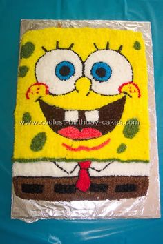 a spongebob cake is decorated with frosting