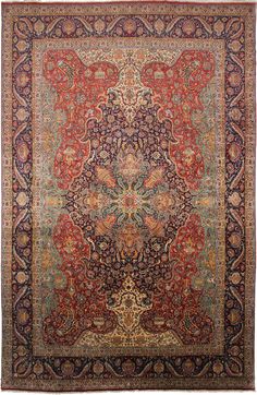 an antique persian rug with red and blue colors