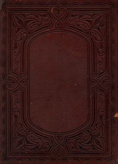 an old book with intricate design on the cover