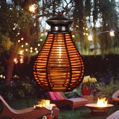 an outdoor patio with lights and wicker furniture