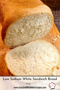 two loaves of bread sitting on top of a cutting board