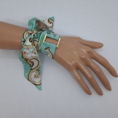 White and light green color satin scarf bracelet with a gold-tone buckle. This handmade ribbon you can use like hair, head, neck, or handbag accessories. A great gift idea for someone who loves handmade! Polyester ribbon size:        100×4.2 cm/ 39.4×1.65 in,        100×3 cm/ 39.4×1.18 in. Gold-tone metal buckle size:         2×2 cm/1.1×1.1 in,         2×3 cm/1.1×1.18 in. Product maintenance: * Wash gently by hand. Do you want to surprise someone you want to greet? Just send me that person's add Scarf Bracelet, Silk Wrap Bracelets, Wrap Headband, Headband Wig, Ribbon Wrap, Headband Wigs, Scarf Tying, Silk Wrap, Vintage Scarf