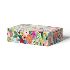 a colorful box with flowers and leaves on it