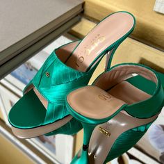 Excellent Brandnew Condition! Gucci Satin Jade Sandals. Size 7.5 (37.5) Silky Fabric Satin. Comes With Two Dust Cover And Box. Retail For 1,195 Plus Tax. Approximately Heels Height 4 Inches. Designer Green Sandals For Party, Elegant Green Mules For Evening, Elegant Green Open Toe Mules, Luxury Green Sandals With Padded Heel, Luxury Green Evening Sandals, Luxury Green High Heel Sandals, Designer Mules With 4-inch Heel, Luxury Green Open Heel Sandals, Designer Green Sandals For Evening