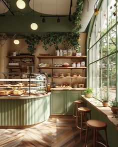 the interior of a bakery with green walls and wooden floors, lots of food on shelves