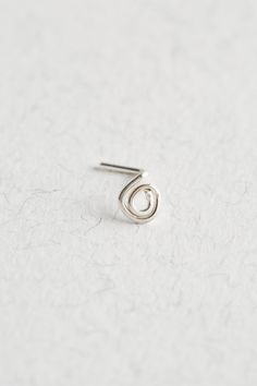 A subtle, sophisticated and perfect way to enhance your style. This stunning Sterling Silver Nose Stud will give you a unique, hand crafted and fresh new look. Whether its work or social, this gorgeous piece will compliment the occasion!  - Handmade using 21 Gauge Sterling Silver. - Very comfortable and easy to wear. - 0.5cm diameter - Making this a minimalist yet understated piece. - Earrings, nose jewellery and personalised items are non-returnable. Designed and produced using the highest qual Nose Jewels, Stud Nose Ring, Silver Nose Stud, Eco Friendly Accessories, Silver Nose Ring, Unique Jewelry Gifts, Nose Rings Studs, Nose Jewelry, Nose Hoop