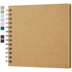 a spiral bound notebook with various colored pages