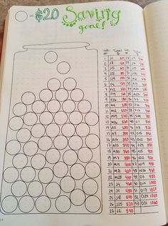 an open notebook with numbers and times on it