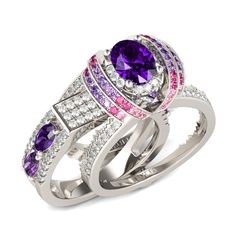 two rings with purple and pink stones on each one, set in white gold plated silver