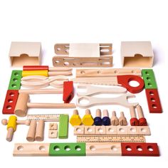 the wooden toy tools are laid out on top of each other