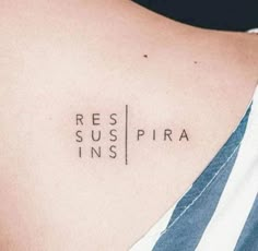 a woman's back with the words rest suspra inked on it