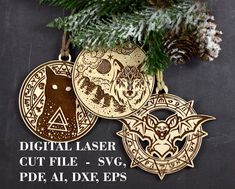 three laser cut wood ornaments hanging from a pine tree with the words digital laser cut file svg