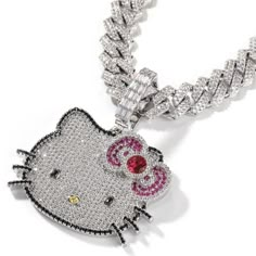 This dazzling Kawaii "Hello Kitty" pendant will add an aura of sophistication and exclusivity to any look. Exquisitely crafted with (grade 5) Sapphires, Rubies and Crystal Gemstones, the intricate micro-pave gives a luxurious non-stop bling look as it sparkles bright in every type of lighting and all atmospheres This set comes Complete with your choice of a single matching twisted rope style or Cuban link style chain in either gold or silver. This statement piece (Both The Pendant and Chain) com Hello Kitty Clothes Aesthetic, Hello Kitty Chain, Matching Pendants, Hello Kitty Necklace, Cool Kids Club, Kitty Necklace, Kawaii Hello Kitty, Hip Hop Bling, Hello Kitty Jewelry