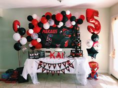 a birthday party with balloons and decorations