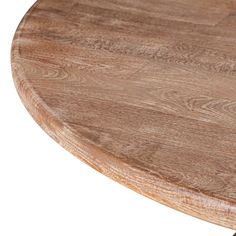 an oval wooden table top on a white background