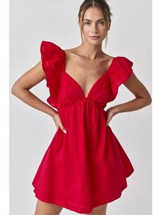 The Audrey tie-back is a mini dress with a bow in back and ruffled sleeves. Flouncy mini skirt at the bottom is accentuated by a gorgeous red shade. Fabric: 100% Cotton. Size guide: Small - 2/4 Medium - 4/6 Large - 6/10 Length :27 5/8 Chest: 15 1/4 Ruffle width: 4 1/2 Model's height is 5' 8" and wearing a size S Dress With A Bow, Ruffle Mini Dress, Ruffled Sleeves, Tie Backs, Size Guide, Mini Skirt, Mini Skirts, Mini Dress, Skirt