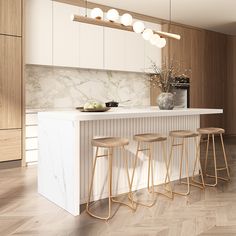 a modern kitchen with marble counter tops and gold barstools, along with wooden flooring