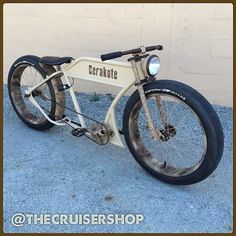 an old fashioned bicycle is parked in front of a building with the words crabdale on it