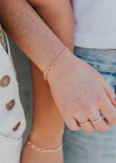 One of you takes an hour to get ready. The other one watches TikTok while they wait. Opposites attract and we're here for it! 6mm Twist Oval Cable Chain + 2.3mm Curb Chain. Bracelet is adjustable from 6.5 - 7". Available in 14kt Gold Fill. Shop our complete Friendship Collection. Handmade in Eau Claire, WI. Our jewelry is handmade so each piece will be unique and may vary slightly from what is pictured. Copper Uses, Everyday Wear Jewelry, Curb Chain Bracelet, High Maintenance, Opposites Attract, Jewelry Cleaner, Curb Chain, 14kt Gold, Ring Bracelet