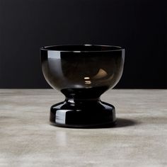 a black bowl sitting on top of a table