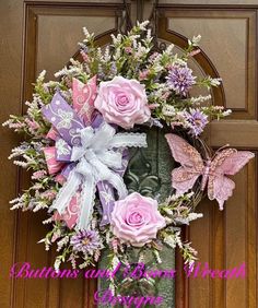 a wreath with flowers and butterflies on the front door